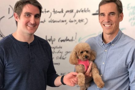Scratchpay co-founders Caleb Morse (left) and John Keatley (right), and resident office poodle, Penny (center)