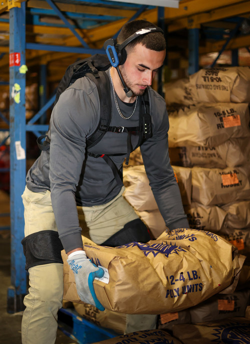 A Warehouse worker wearing Verve Motion's exosuit. Photo courtesy of ADUSA Distribution